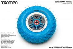 White Gloss and Black logo Rim with Blue Anodised Spokes and Blue Alpha tyre and Red Bearings