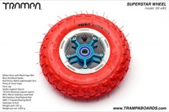 White Gloss and Black logo rim with Blue Anodised Spokes Red Alpha tyre and Blue Bearings