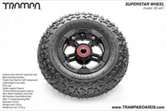Carbon Rim with Black Anodised spokes and Black Trampa tyre